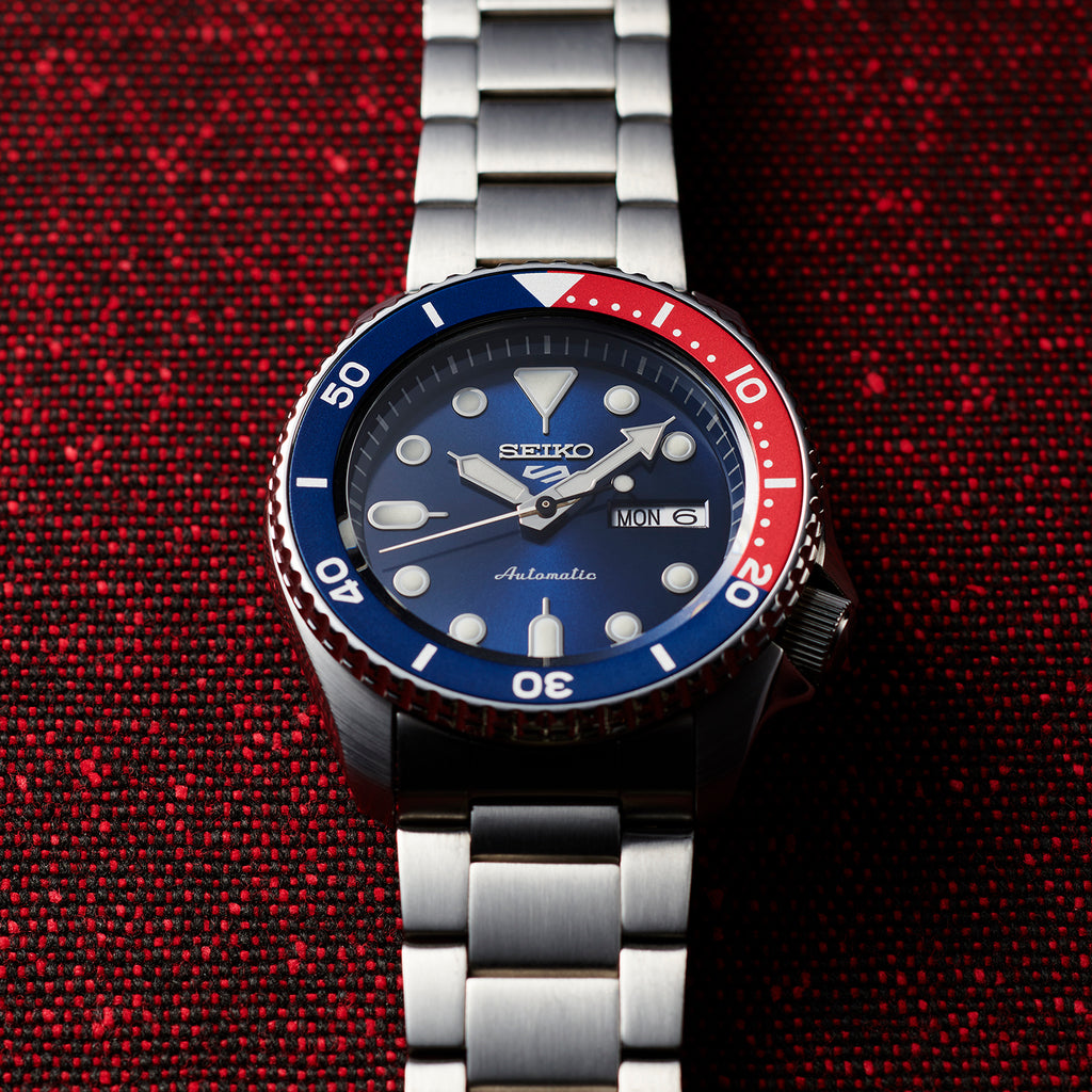 Seiko 5 Sports SRPD53K1 with Automatic Movement, Blue Sunburst Dial, and Day/Date Display